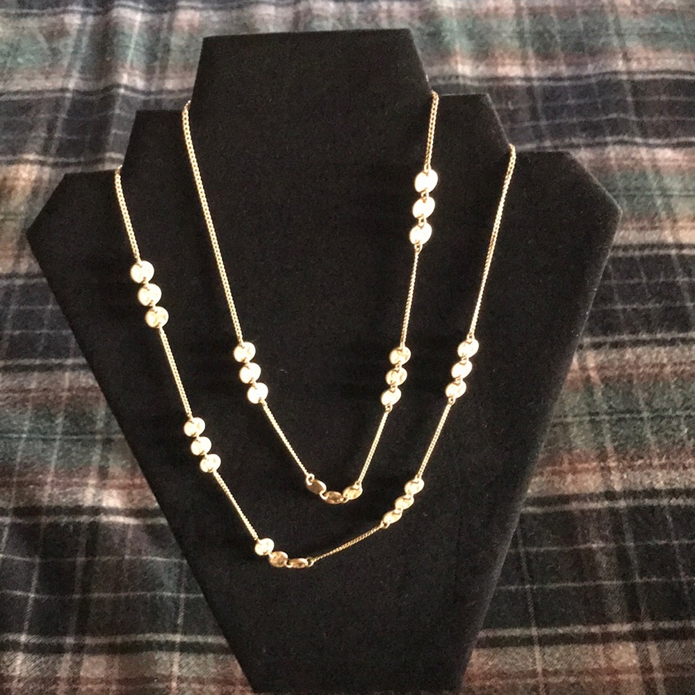Goldstone chain with stamped discs.